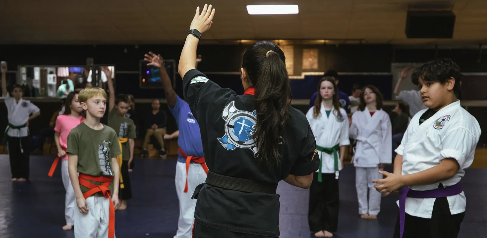 Instructor leading a full kids' class at the Virginia Beach East location
